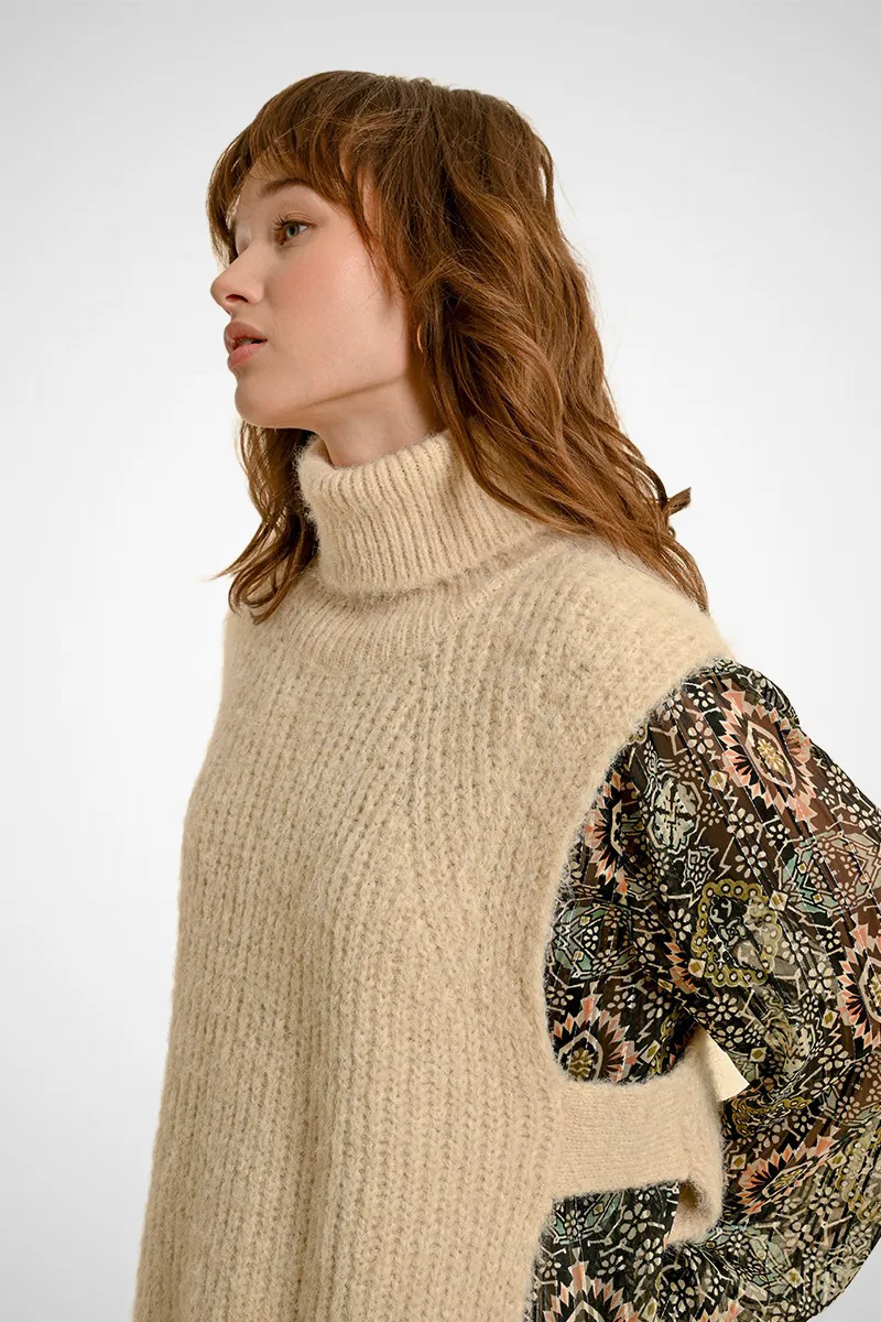 Sleeveless Openwork Sweater With Turtleneck